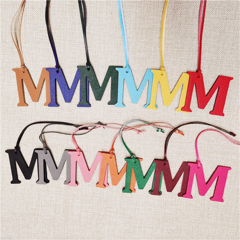 XMESSUN سلسلة مفاتيح جديدة بحر - مراجعة Monogram Keychain Leather وسعره